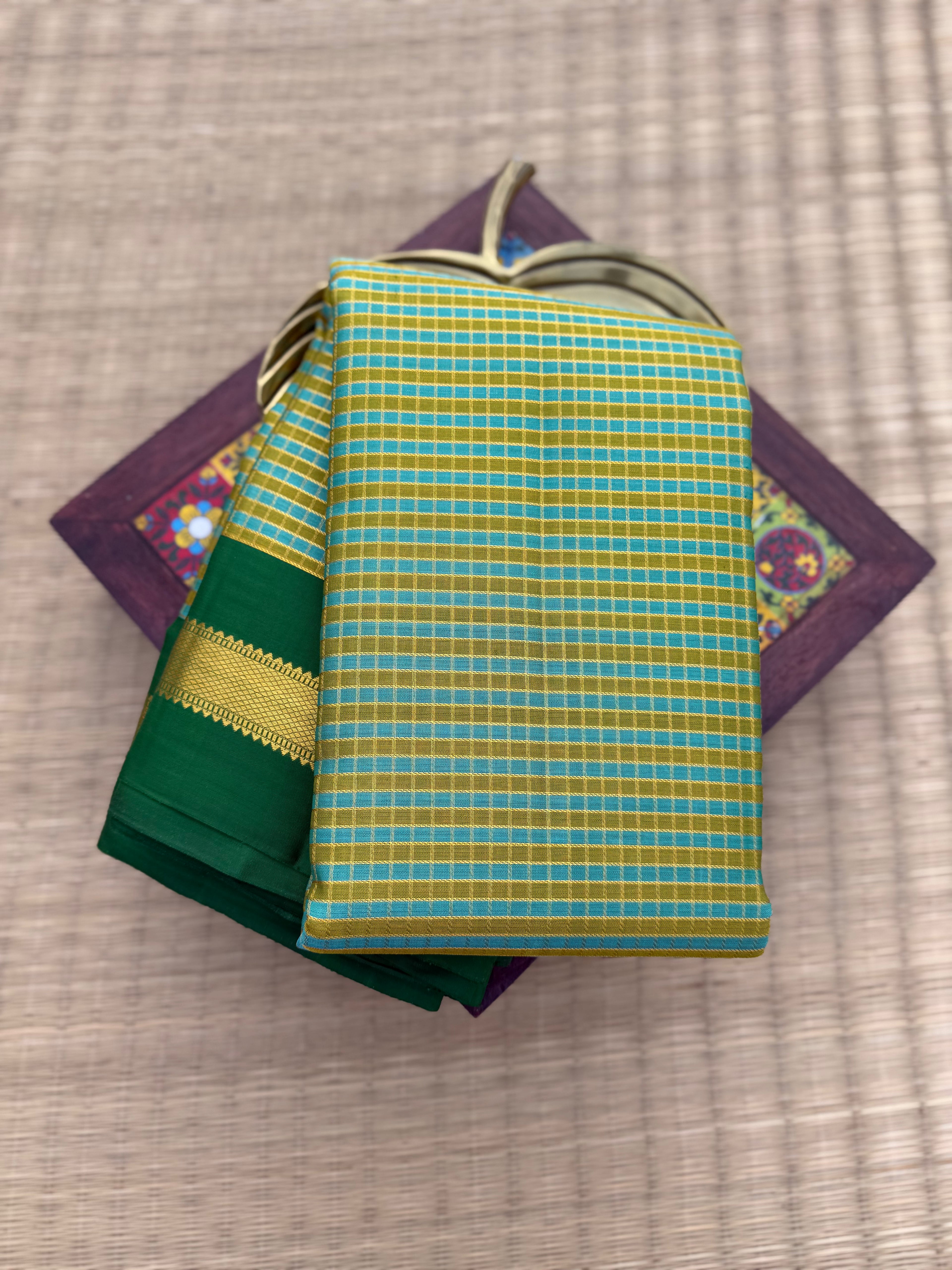 Pure Kanchipattu Saree – Aqua Blue green checks with Green Border