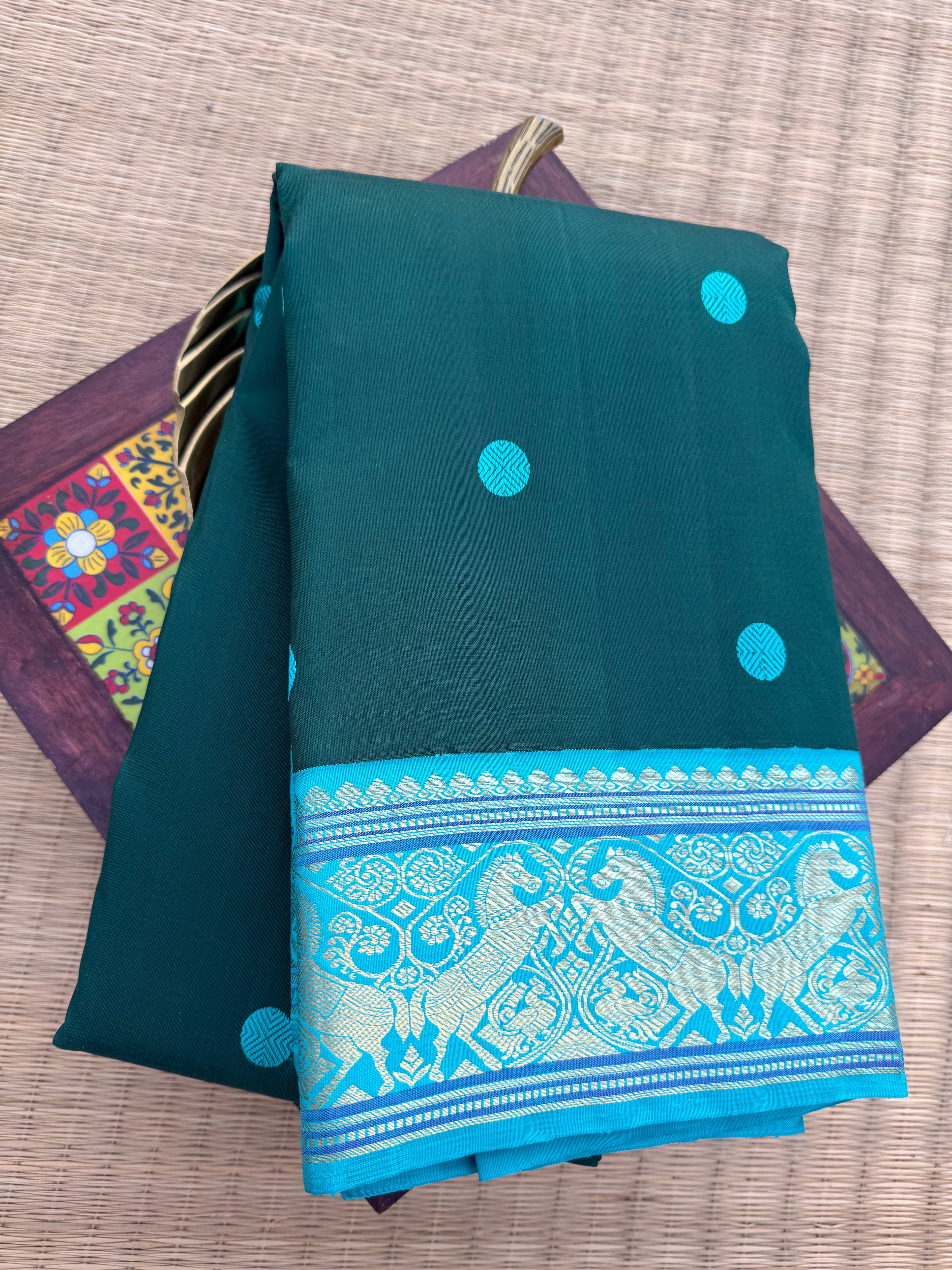 Pure Kanchipattu Saree – Bottle Green with Sky Blue Border