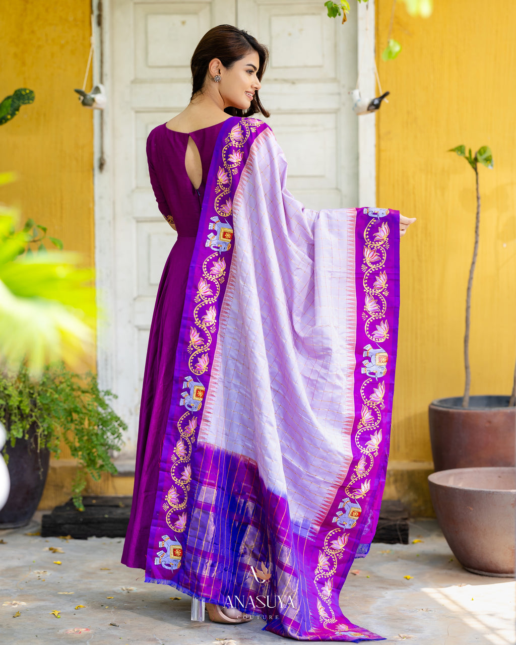 Purple silk Anarkali with Tanjavure painting